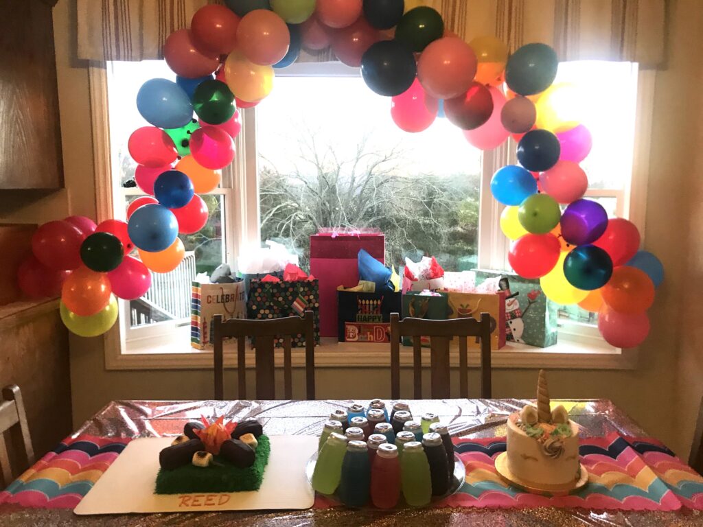 Balloon arch. I had wanted to make it like a rainbow, but the balloons had their own ideas. Haha!