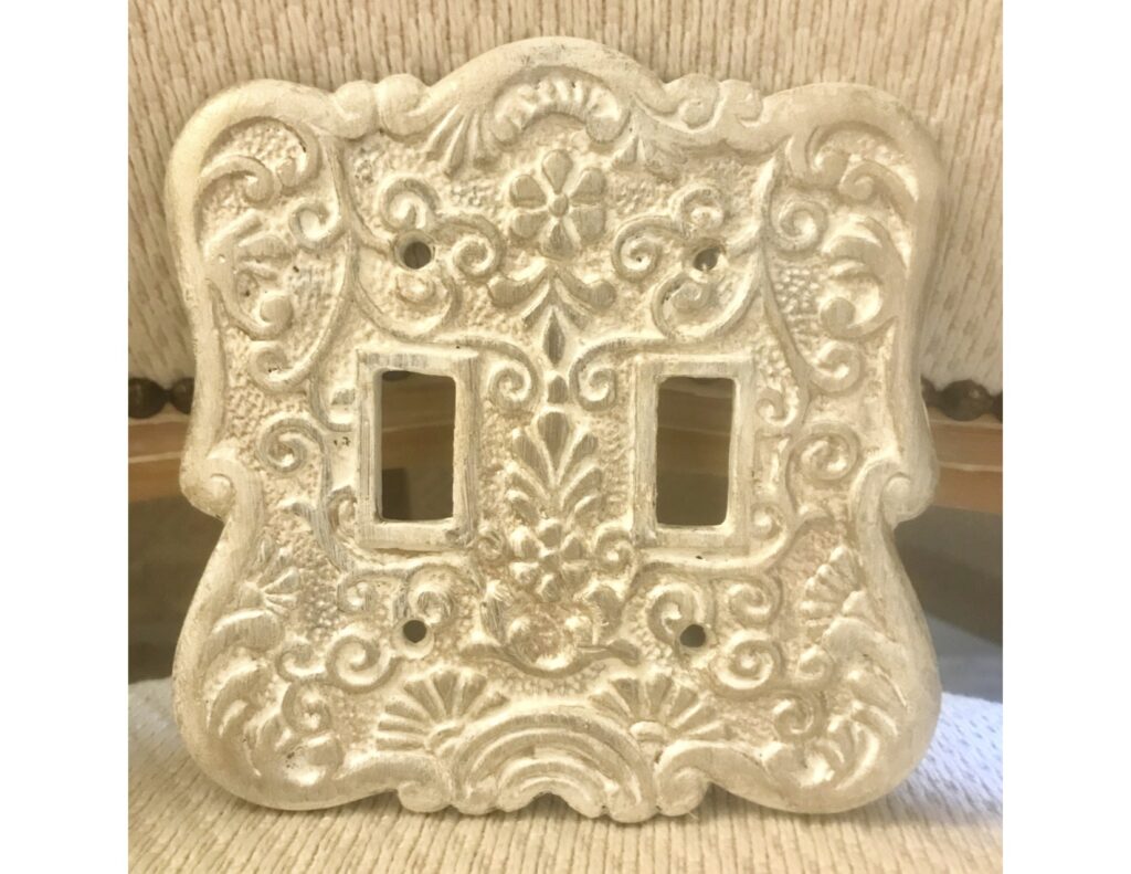Finished painted light switch cover with gold finish
