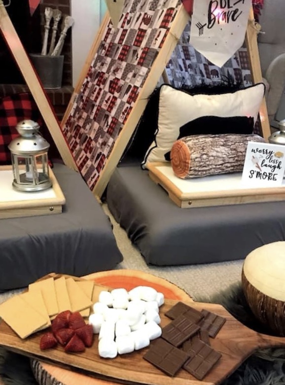 Tents with faux charcuterie board in front of them