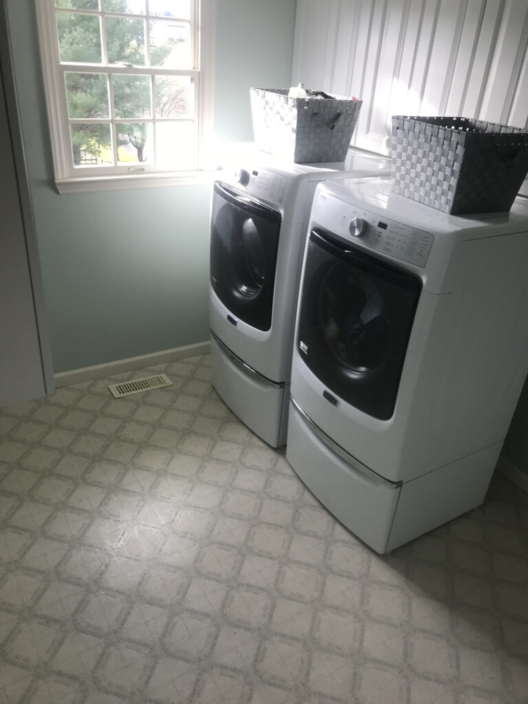 Laundry Room Floor before picture with Linoleum.