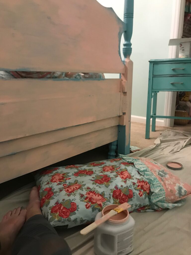 Picture of headboard being painted.