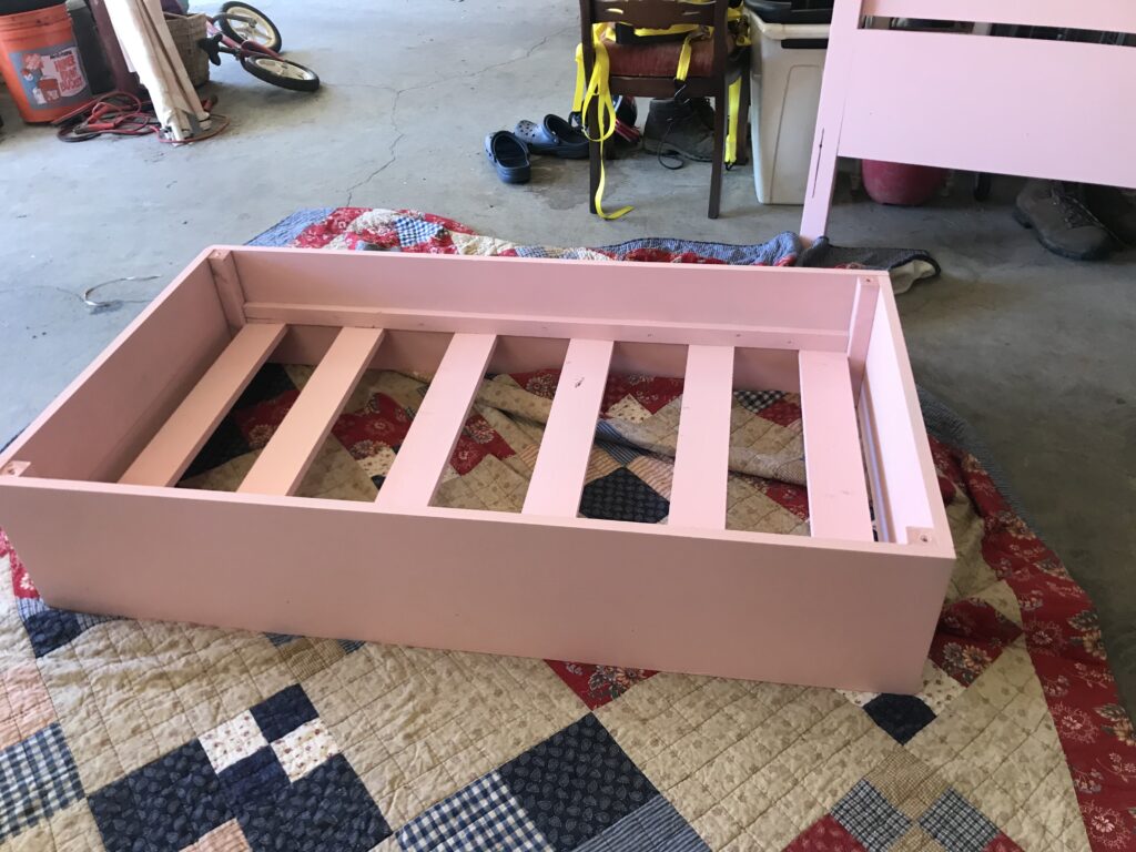 DIY box frame for little girl's bed.